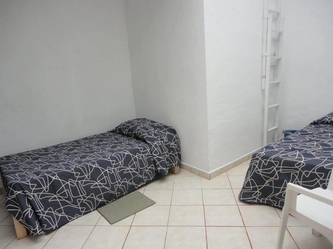 تيبوزتلان Hostal Villa Quieta المظهر الخارجي الصورة